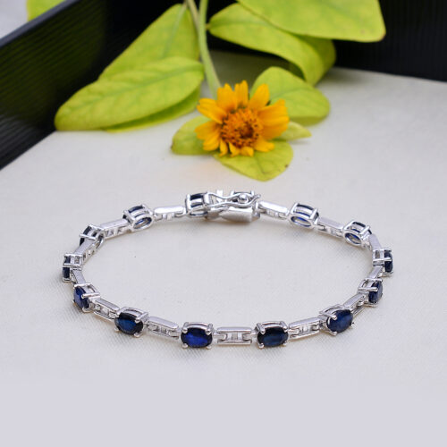 Oval blue sapphire bracelet in silver