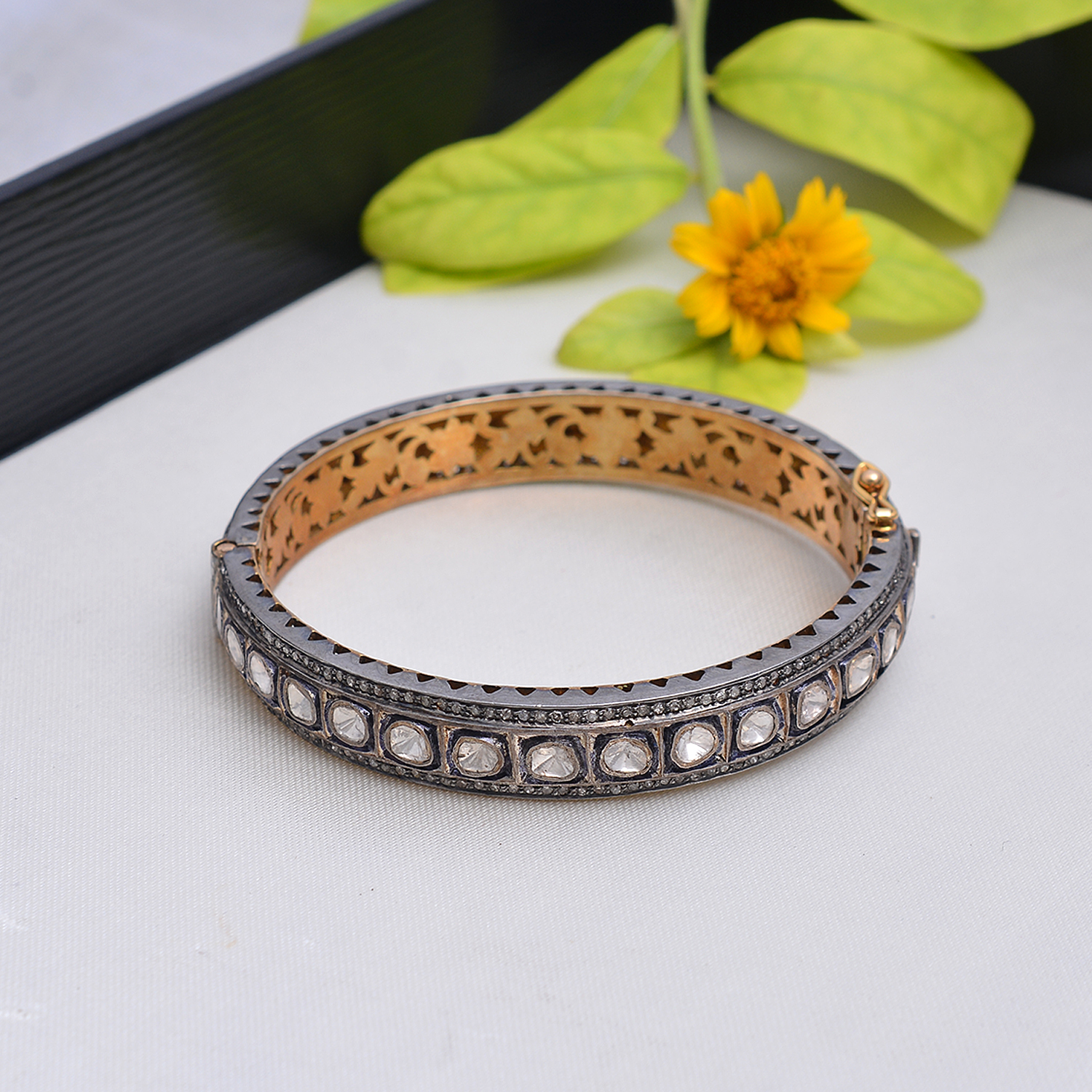 Victorian bangle with diamond polkis & uncut diamonds in gold plated silver