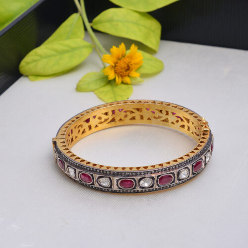 Rubies, diamond polkis & uncut diamonds Victorian bangle in gold plated silver