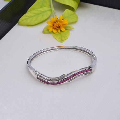 Rubies & diamonds bangle in silver
