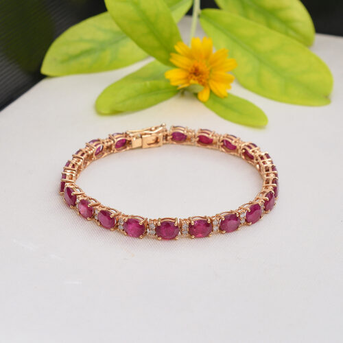 Oval rubies & diamonds in 18ct yellow gold