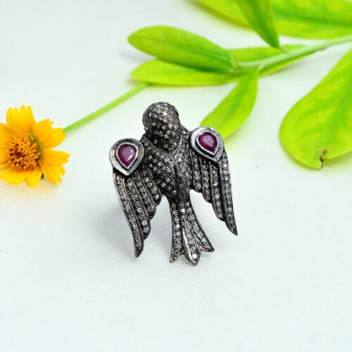 Pear shape rubies & uncut diamonds falcon victorian ring in silver