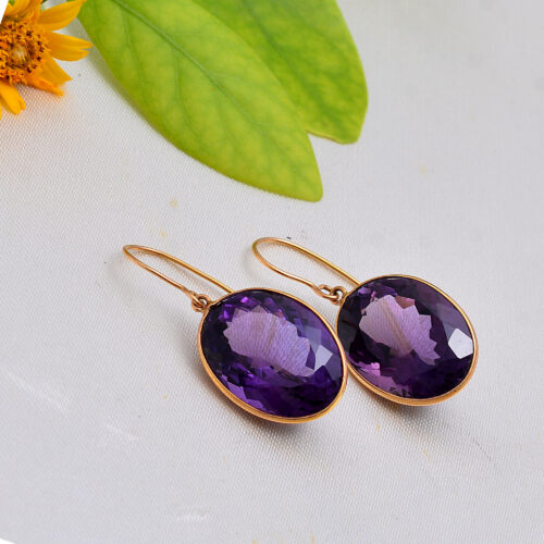 Oval emythist Bazel earrings in 18KT gold