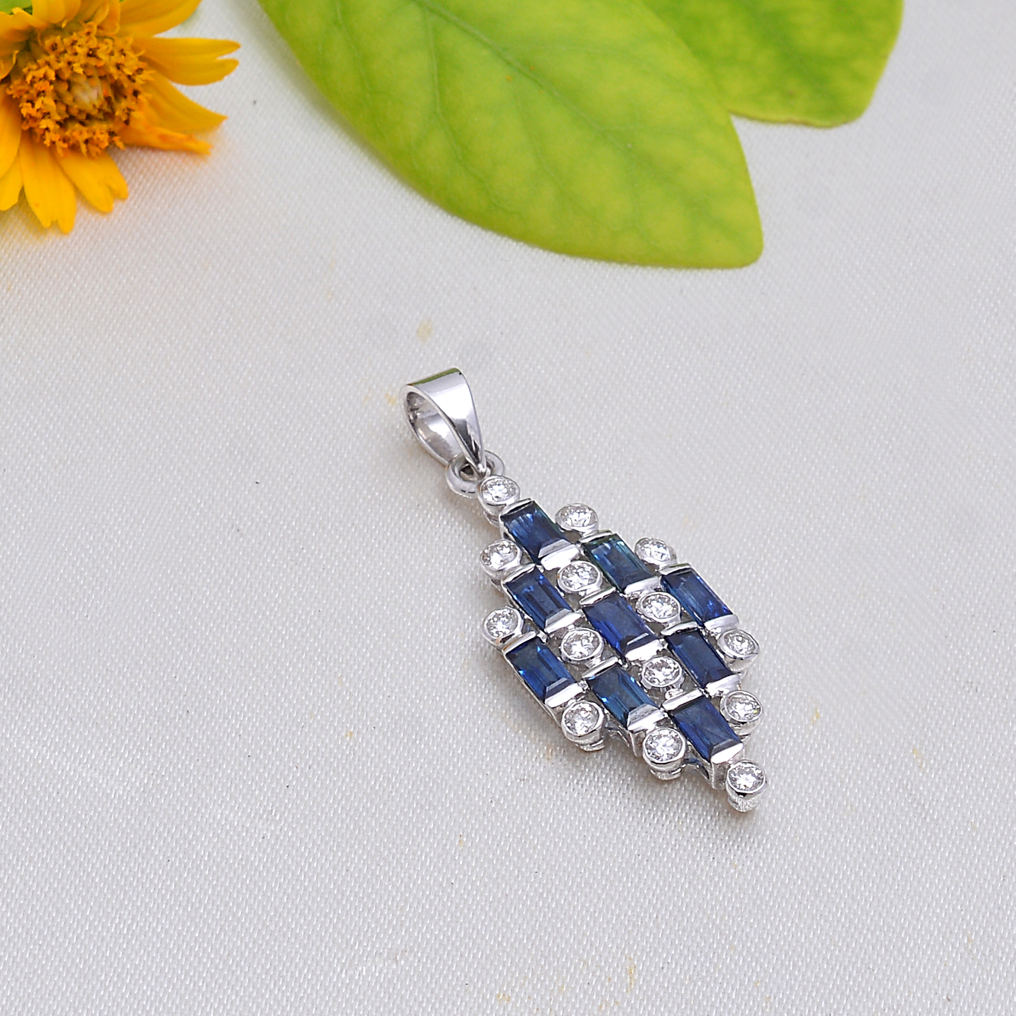 Blue sapphire baggets & diamonds pendant in 18KT white gold