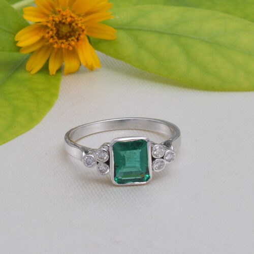 Square shaped emerald & diamond ring in 18KT white gold