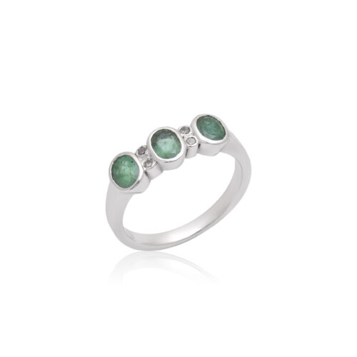 Oval shaped emeralds and diamond in silver ring