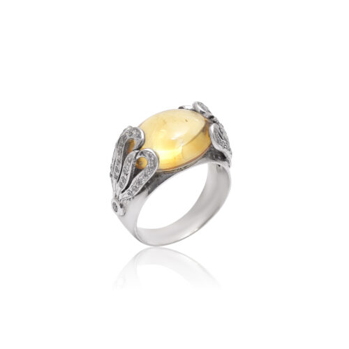 Citrene cabochon with cubic zirconia in silver ring