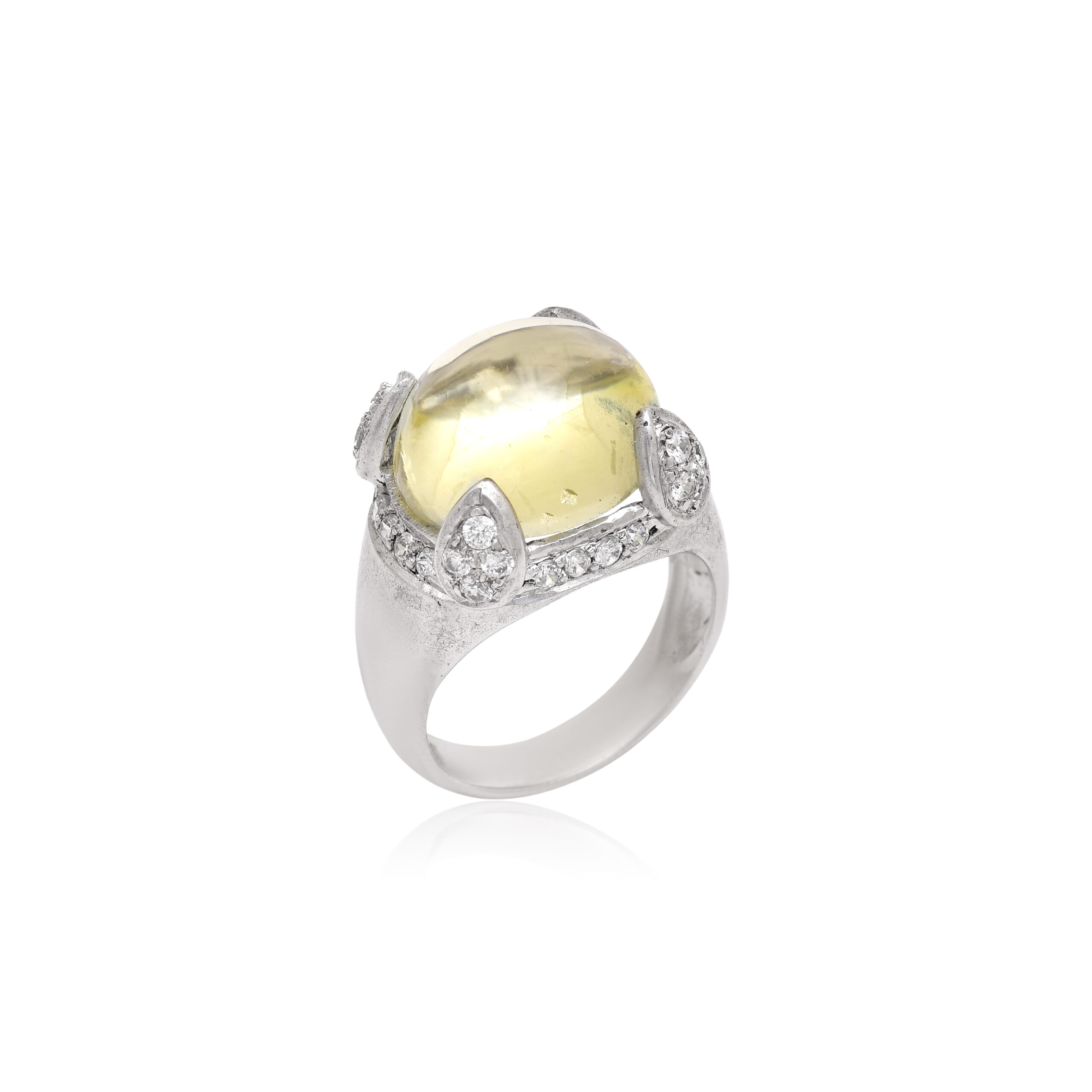 Citrene cabochon with cubic zirconia in silver ring