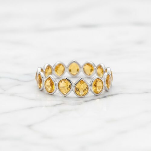 Pear citrines bezel ring in silver