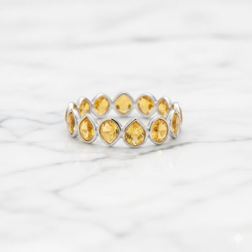 Pear citrines bezel ring in silver