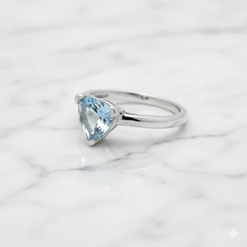 Trillion blue topaz in silver ring
