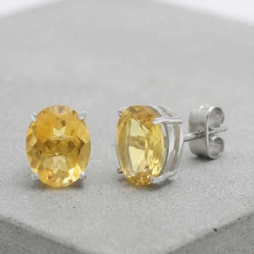 Oval golden topaz stud earrings